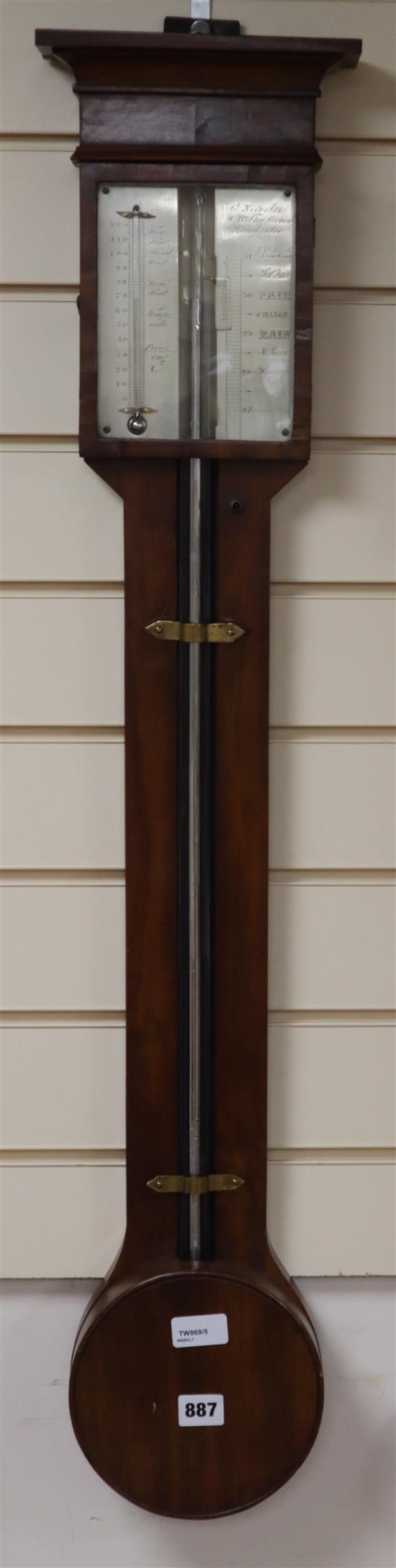 A mahogany stick barometer by G. Negretti, 4 Withy Grove, Manchester, with silvered scales and circular reservoir cover H.100cm